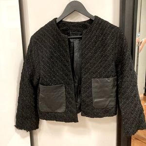 Veste avec poche en cuir